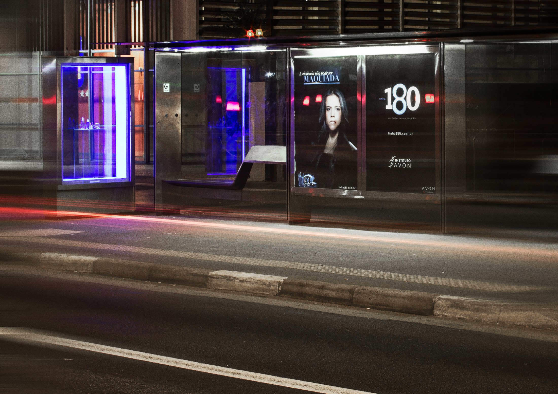 Avon 180 outdoor installation at a bus shelter at night