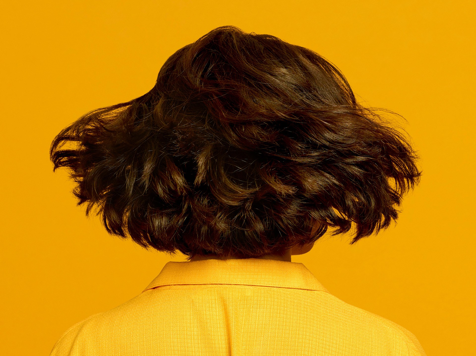 Eume campaign portrait showing hair and personal identity