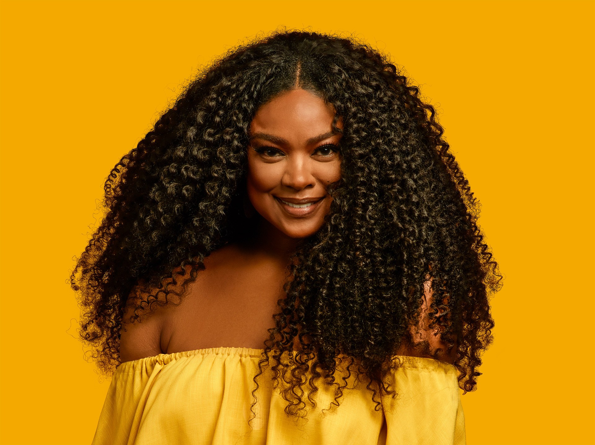 Eume campaign portrait showing hair and personal identity